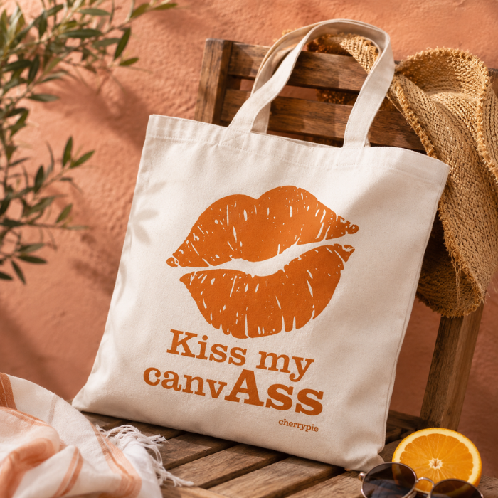 Wit-oranje canvas strandtas "Kiss my CanvAss"